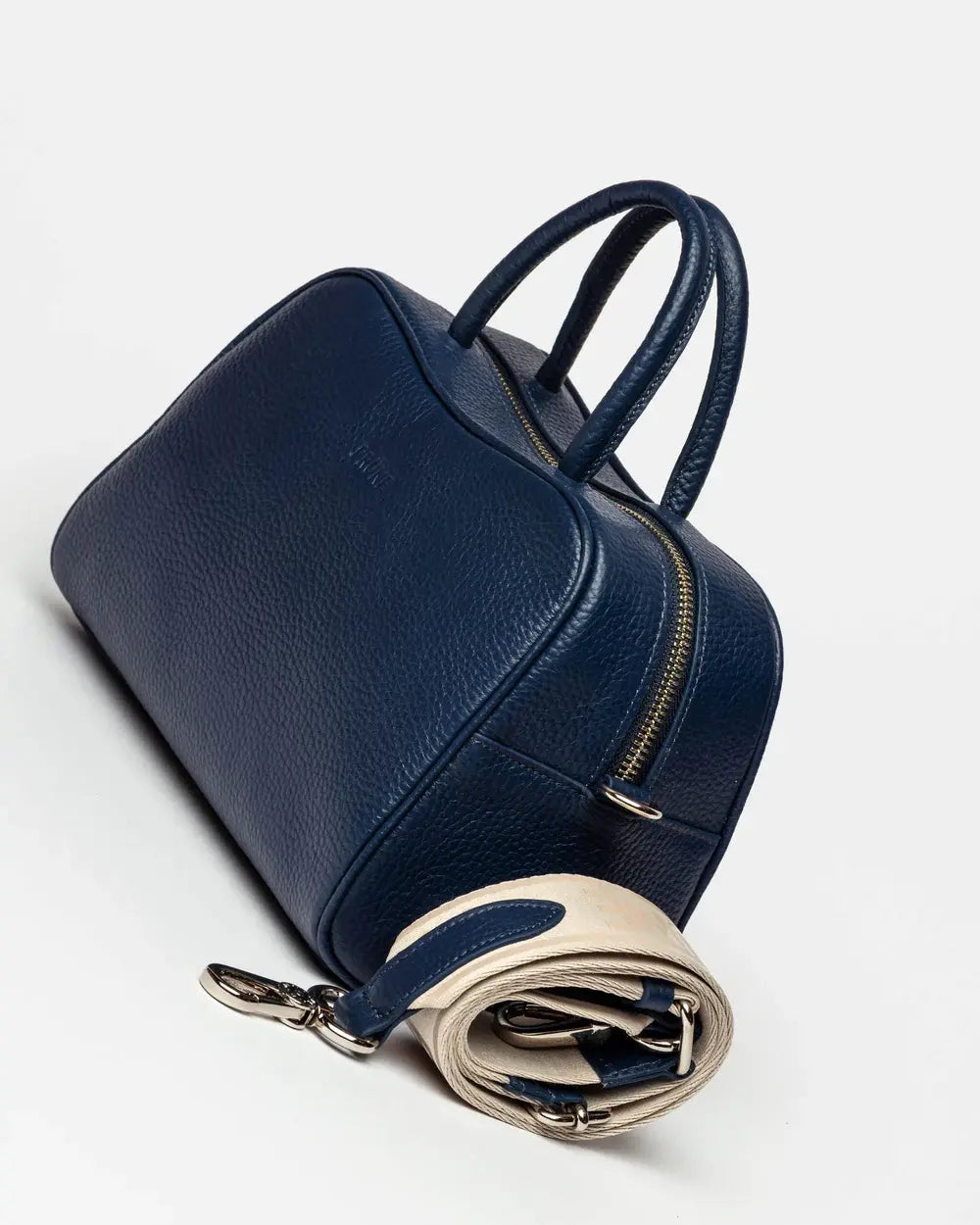 CARTERA DE MANO THE CLUB EN CUERO GRANEADO